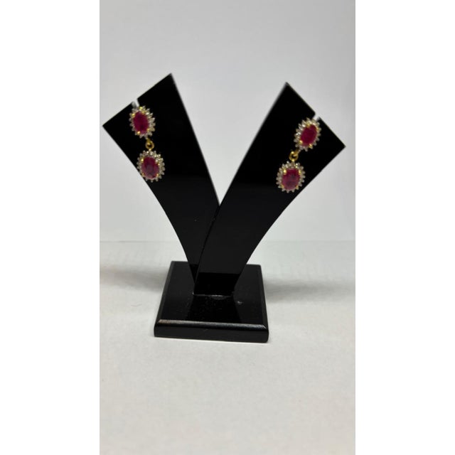 Gemstone details Diamond weight: 0.51 cts Ruby weight: 2.82 cts 14K gold Gross weight: 3.68 grams Gold weight: 3.01 grams...