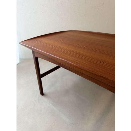 Some coffee tables instantly bring a sense of calm to a room. This Swedish designer coffee table from the 1960s is a...