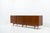 The 1950s Danish-designed Triennale sideboard, created by Arne Vodder (model 29A), is named after its debut at the Milan...