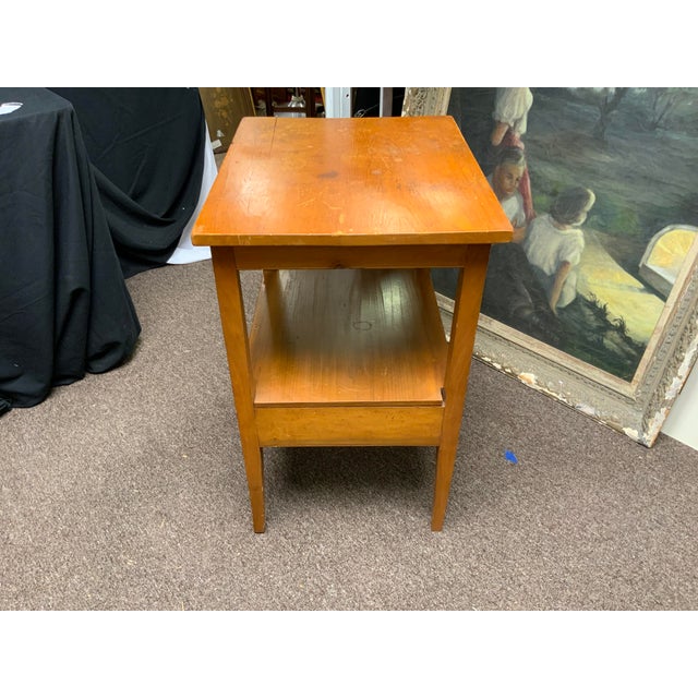 Handcrafted country American table. Dovetail drawer construction, finish not original with some stains and ware to top.