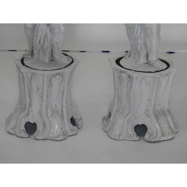Ceramic Pair of 19th Century Italian Glazed Terracotta Cherubs on Tree Trunk Pedestals For Sale - Image 7 of 9
