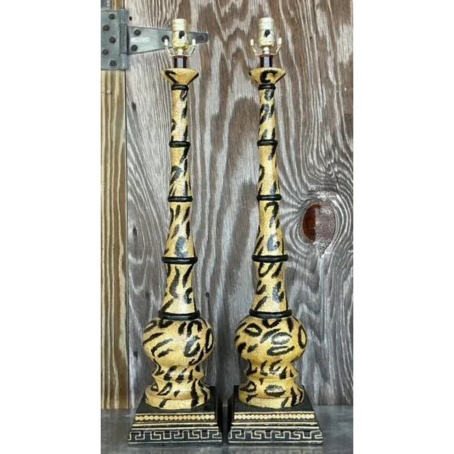 Embrace the allure of the wild with our Vintage Hand-Painted Leopard Lamps - A Pair. Crafted with meticulous attention to...