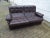 The leather is very dark brown. For a lounge set, that dates from the 1970, this set is still in good condition. The two...