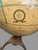 Cram's Imperial World Globe With Textured Mountain Ranges & Paw Footed Iron Base For Sale - Image 12 of 12