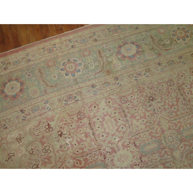 An early 20th-century Indian Amritsar rug woven with the finest of quality and wool. The medallion is almost forgotten due...