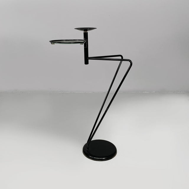 Italian modern coffe table with ashtray in black metal and glass, 1980s Coffee table with round ashtray, in black metal....