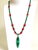Artisan Genuine Malachite Necklace With Large Sculptural Pendant and Red Bamboo Seeds Detail For Sale - Image 11 of 17