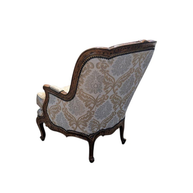 Late 20th Century French Provincial Louis XV Style Carved Wingback Bergère Chair in Damask For Sale - Image 10 of 12