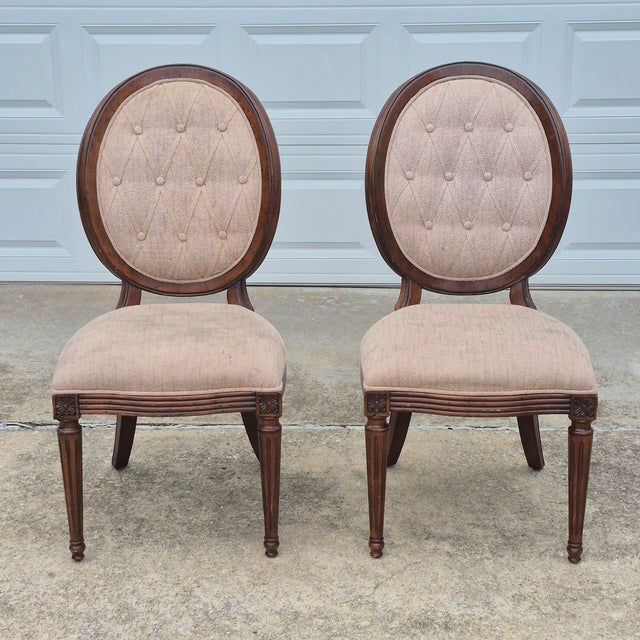 Hooker Furniture Oversized Louis XVI Tufted Oval Back Side Chairs, A Pair Each chair measures 43.5” tall, 21” wide, and...