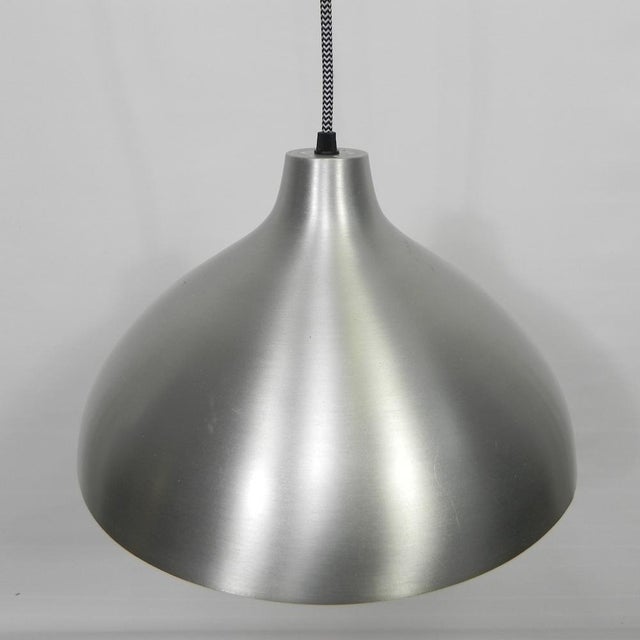 Height: 90 cm. Ø: 34 cm. Height hood: 20 cm. We have provided the lamp with a new suspension system with iron cord and a...