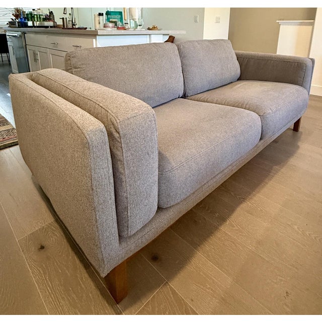 -Engineered hardwood frame with reinforced joinery. -Solid wood legs (non-removable) in an Acorn finish. -Webbed seat and...