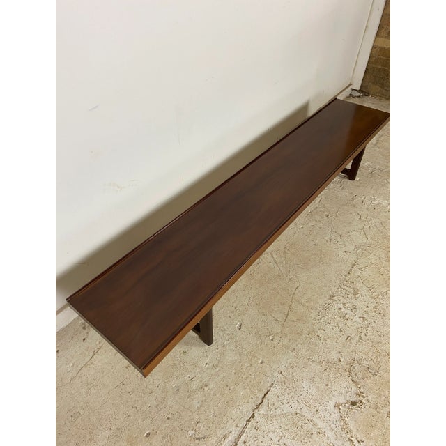 One of three we have available, this one is rare since it is walnut. Originally created in teak or rosewood, this example...