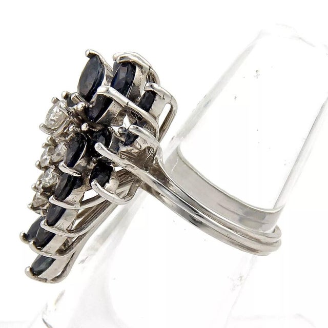 Material: 14k white gold Measurement: 1.22" long x 0.78" wide x 0.55" Diamond: Approx 0.75ct Sapphires: Approx 2ct Ring...