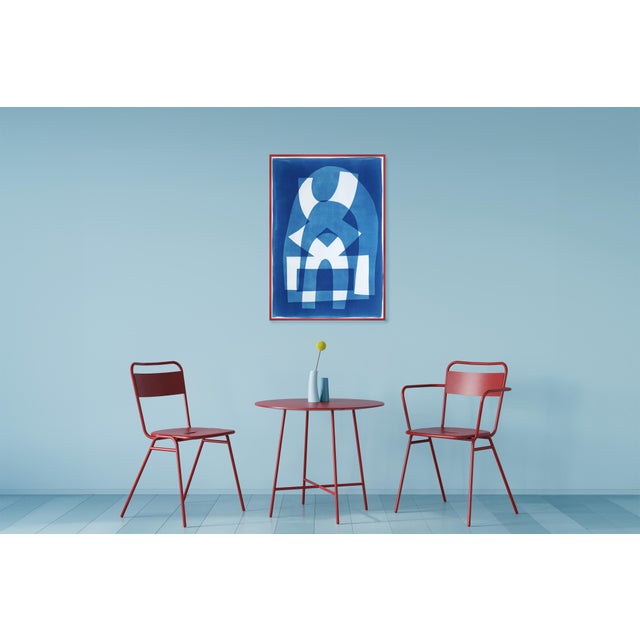 This handmade cyanotype monotype presents a striking interplay of geometric abstraction and atmospheric depth. Layered...