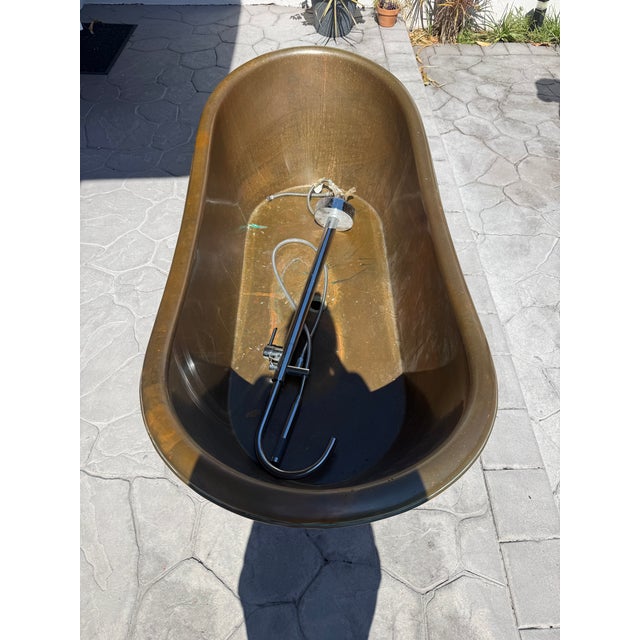 Beautiful luxury copper freestanding bathtub with stunning mosaic exterior detail. Very unique designer-style statement...