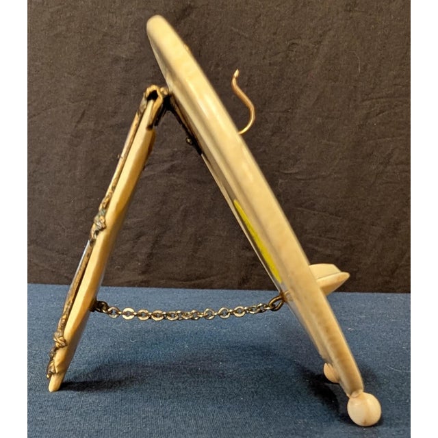 This vintage late 19th century Japanese decorated pocket watch display stand is desigbned with elaborate carvings of a...