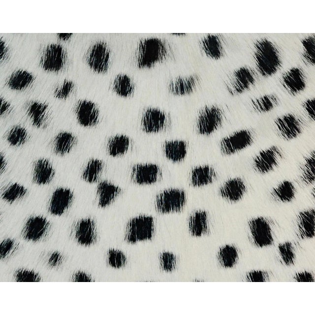 Black speckles create a luxurious pattern that embellishes this lush genuine goatskin pillow. Use alone or in pairs to...