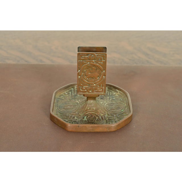 A gorgeous antique Arts & Crafts or Art Deco period bronze match box holder featuring symbols of the Zodiac By Tiffany...