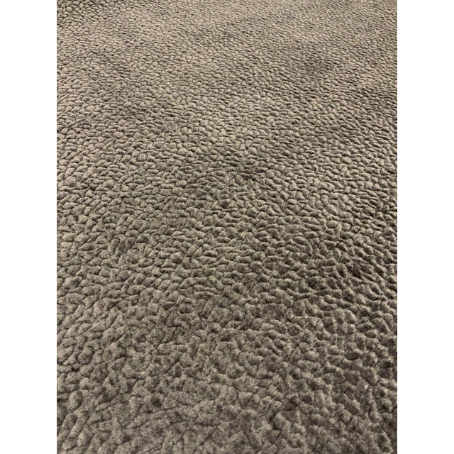 The luxurious gray chenille fabric has a soft hand and is multipurpose. It is a first quality designer good from Kravet...
