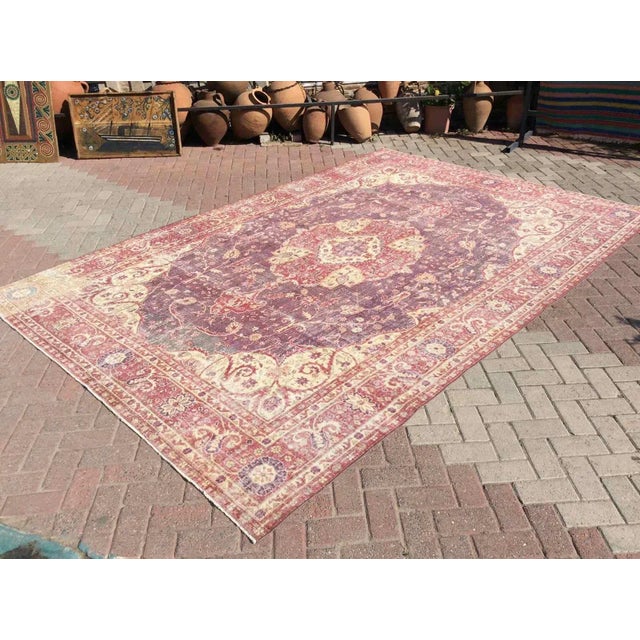 This gorgeous Hand knotted Vintage Anatolian area rug is approximately 60 years old in excellent vintage condition. The...