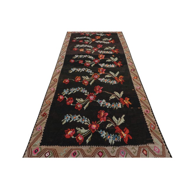 This vintage Turkish flat-weave kilim rug features a Bessarabian style, whose origins are traced to Romania and select...