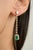 Elevate your style with these modern allure emerald dangling earrings. Featuring radiant emeralds and brilliant diamonds,...