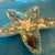 Bring a touch of coastal charm into your home with this beautiful starfish-shaped decorative wooden dish. The piece...