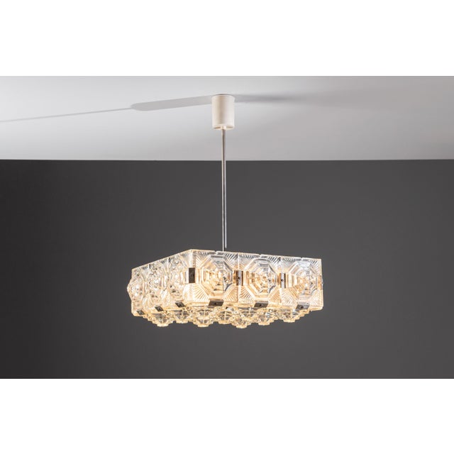 Designed during the 1960s–1970s by celebrated Czech designer Jaroslav Bejvl, this striking square pendant light stands as...