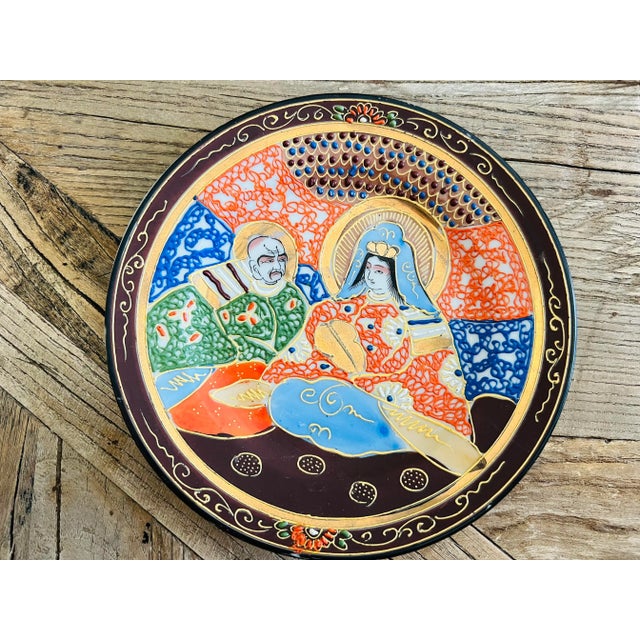 Vintage hand painted Japanese China set consisting of a teapot, sugar (missing a lid) and creamer, and of 3 plates....