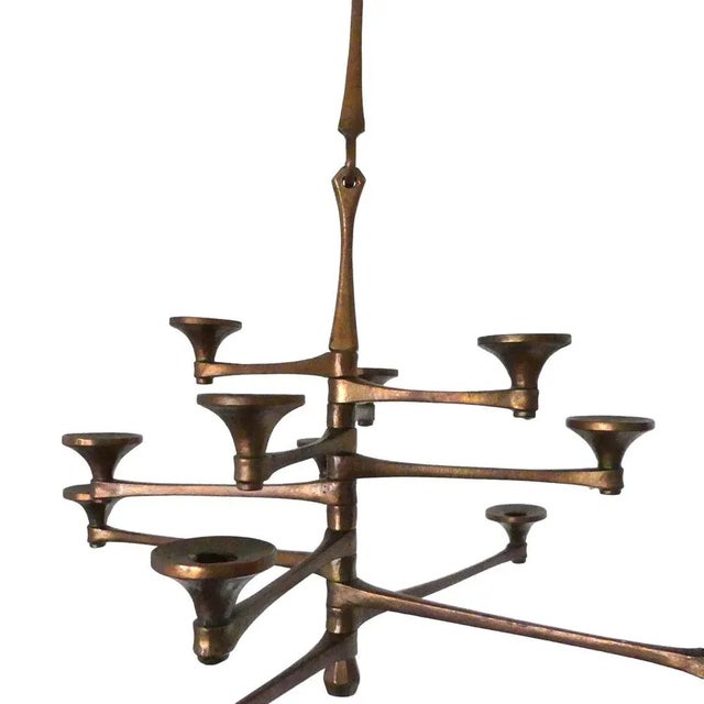 12-light brutalist bronze ceiling candle holder. No manufacturer's markings, presumably Harjes Metallkunst.