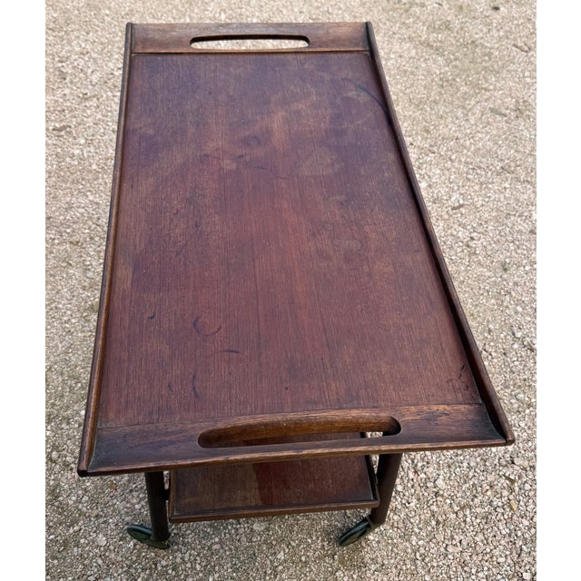 Mid-Century walnut tea cart from Paris apartment.