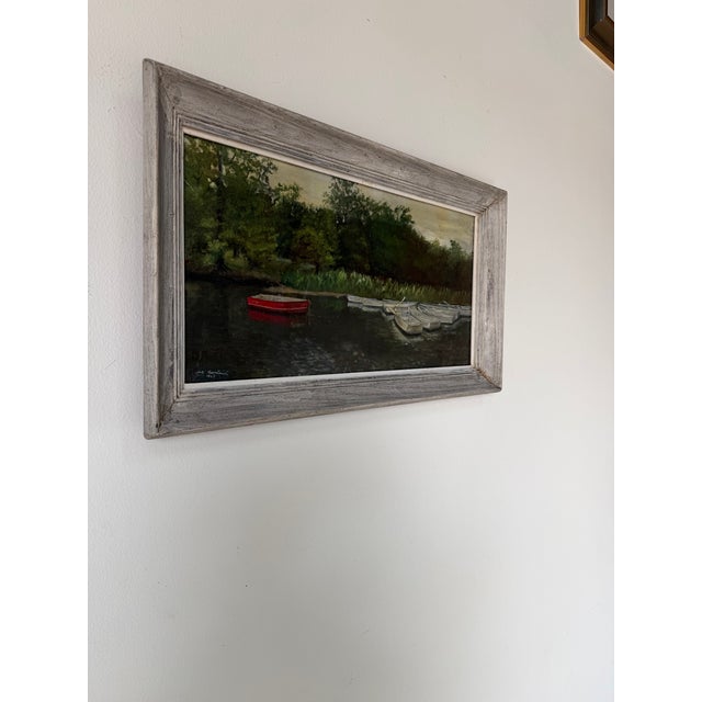 Beautiful 1960s Mid Century Impressionist oil painting depicting a serene lakeside scene with docked boats and a striking...