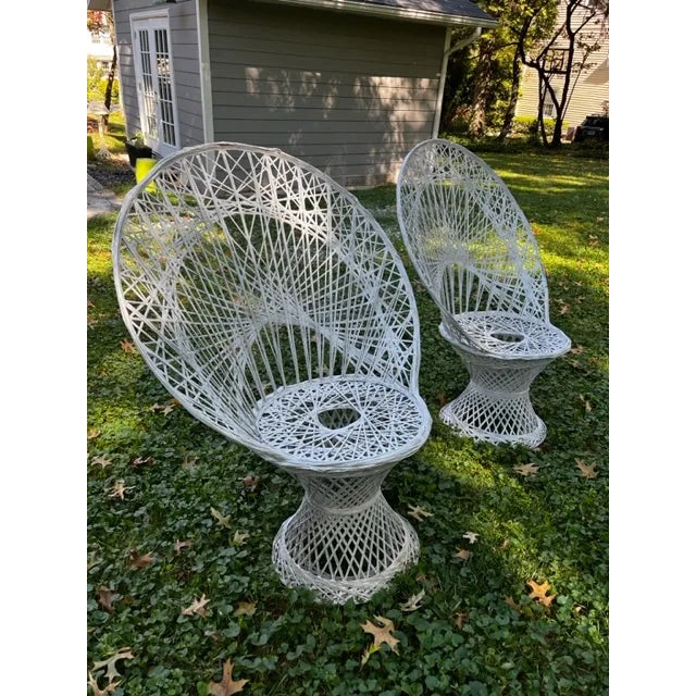 Wonderful mid-century pair of peacock chairs, by Russel Woodard. Made entirely woven spun fiberglass which is lightweight...