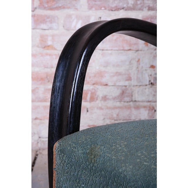 Model: h-269 conceived in the spirit of interwar art deco, this exceptionally iconic and dynamically shaped armchair...