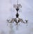 This is a Spanish style bronze chandelier with ornate designed frame, black details that highlight its beauty.Decorated...