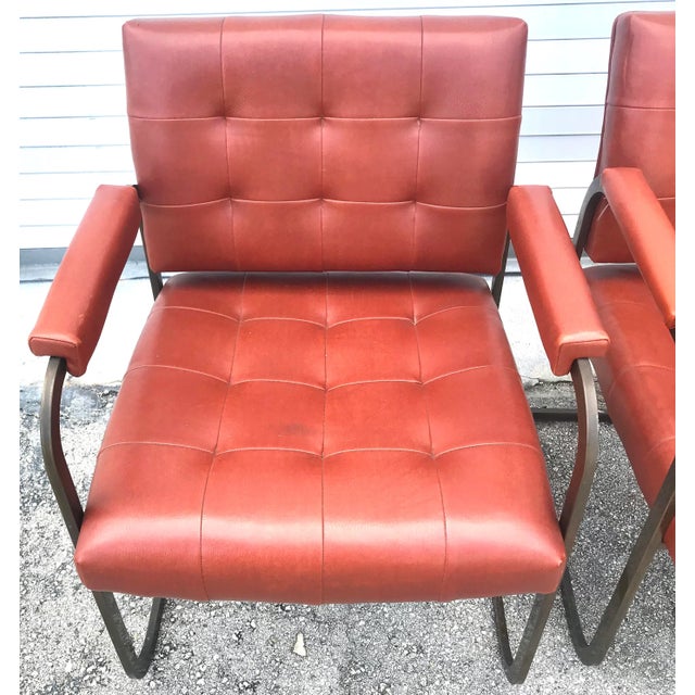 Stunning set of 4 brownish red Patrician furniture chrome and leather chairs in very good condition The seats are tiffed...