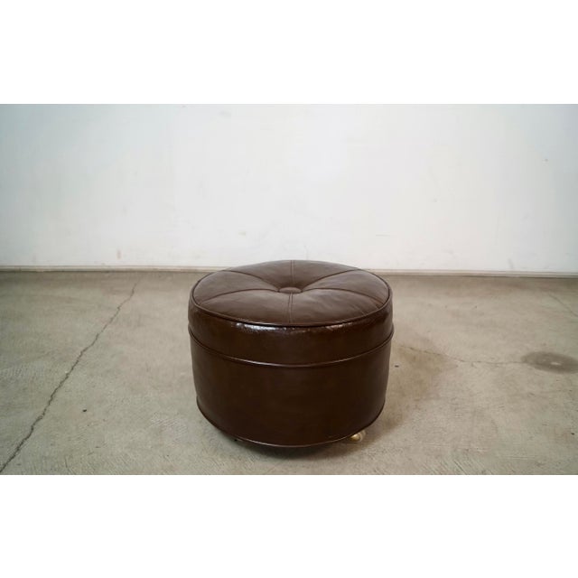 Vintage Midcentury Modern pouf stool for sale. Has the original faux leather naugahyde in brown, and is in excellent...