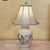 Vintage American ceramic table lamp featuring a cream glazed porcelain body with hand-painted chrysanthemum blossoms,...