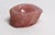 A bowls made of thoroughly processed natural minerals of various kinds. Rose quartz and agate.