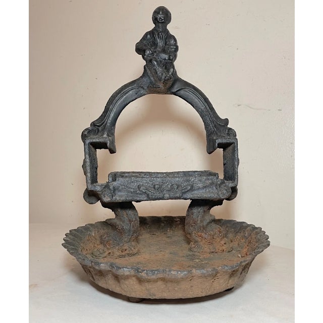 Up for sale is a very rare antique 19th century cast iron figural Americana boot scraper. It's cast out of very thick...