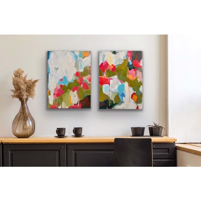 Arc de Fleurs presents an abstract floral composition, where vibrant hues of pink, green, and soft blues intertwine to...
