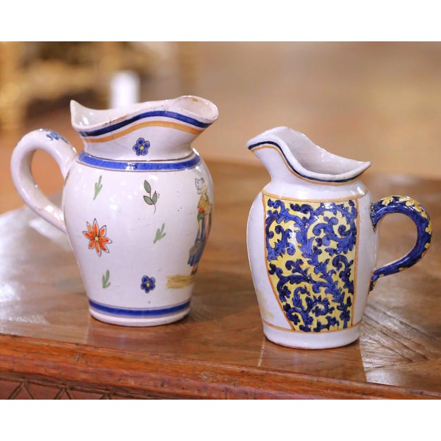 French Pair of 19th Century French Quimper Faience Jugs With Breton Figures and Floral For Sale - Image 3 of 13