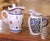 French Pair of 19th Century French Quimper Faience Jugs With Breton Figures and Floral For Sale - Image 3 of 13