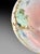 An antique Limoges porcelain punch bowl, produced in France during the late 19th or early 20th century. It features a...