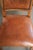 This set of 6 sheepskin dining chairs is crafted in a warm cognac color. The chairs feature a beautiful patina and are...
