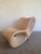 Striking vintage sculptural lounge chair crafted entirely from natural rattan, featuring an extraordinary flowing...