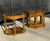A striking pair of vintage burl wood accent tables blending mid-century modern and Hollywood Regency design. This set...