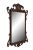 Vintage American Chippendale / Federal style wall / vanity mirror featuring a carved mahogany frame with pierced...