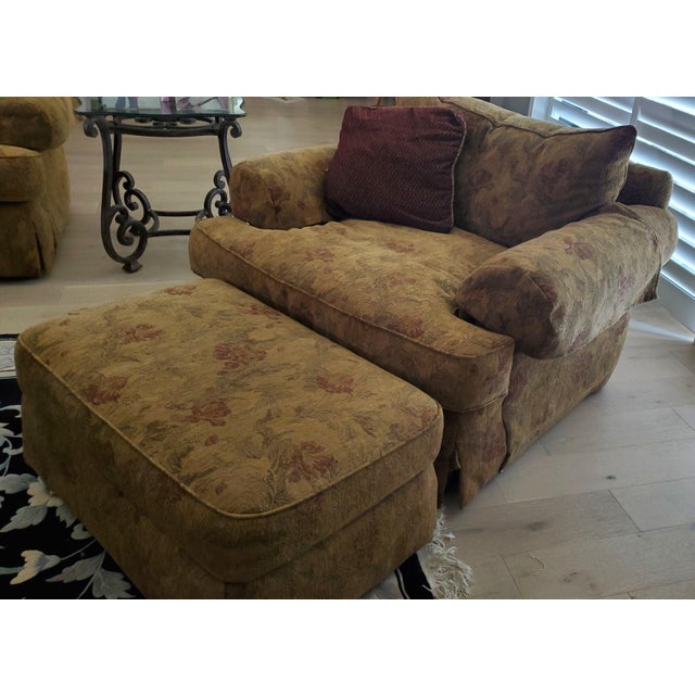Classic elegance and extreme comfort, in earth tones. A vintage oversized skirted pillowback chair by Thomasville...