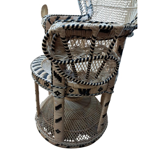 This beautiful and highly decorative Emmanuelle Peacock Chair dates from the 1970s and is a striking example of this...